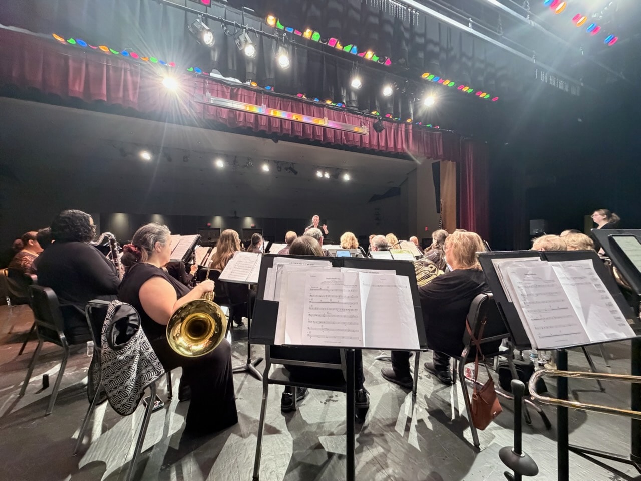 Moorestown Community Band orchestra rehearsal on stage
